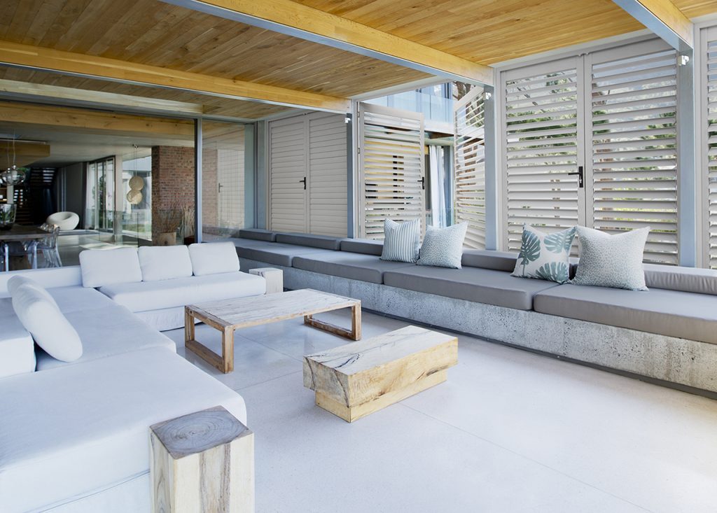 shutters in an enclosed outdoor area with door handles